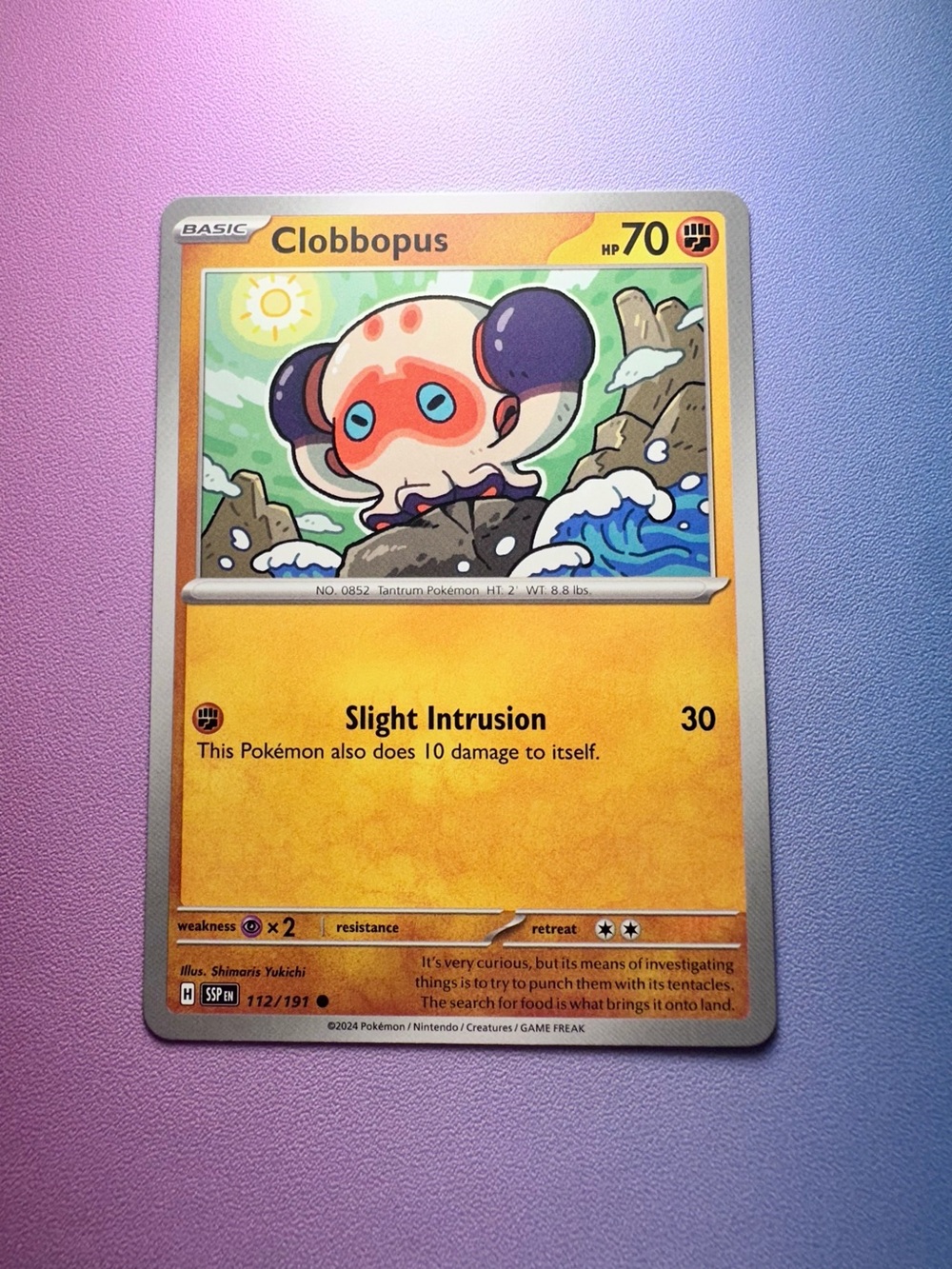 clobbopus - 112/191 (common) — pokemon: surging sparks